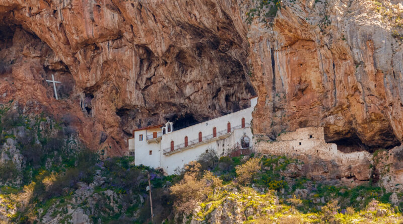 The monastery of Kandila near Tripoli in Greece, build under the shade of a rocky hill in Central Peloponnese Greece