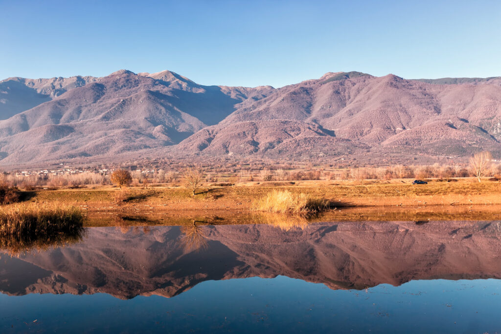 Reflection of mountains on Kerkini lake, Serres in northern Greece