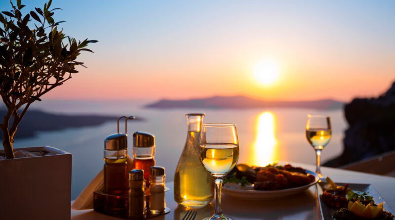 Dinner for two at the caldera, sunset in Santorini, Greece