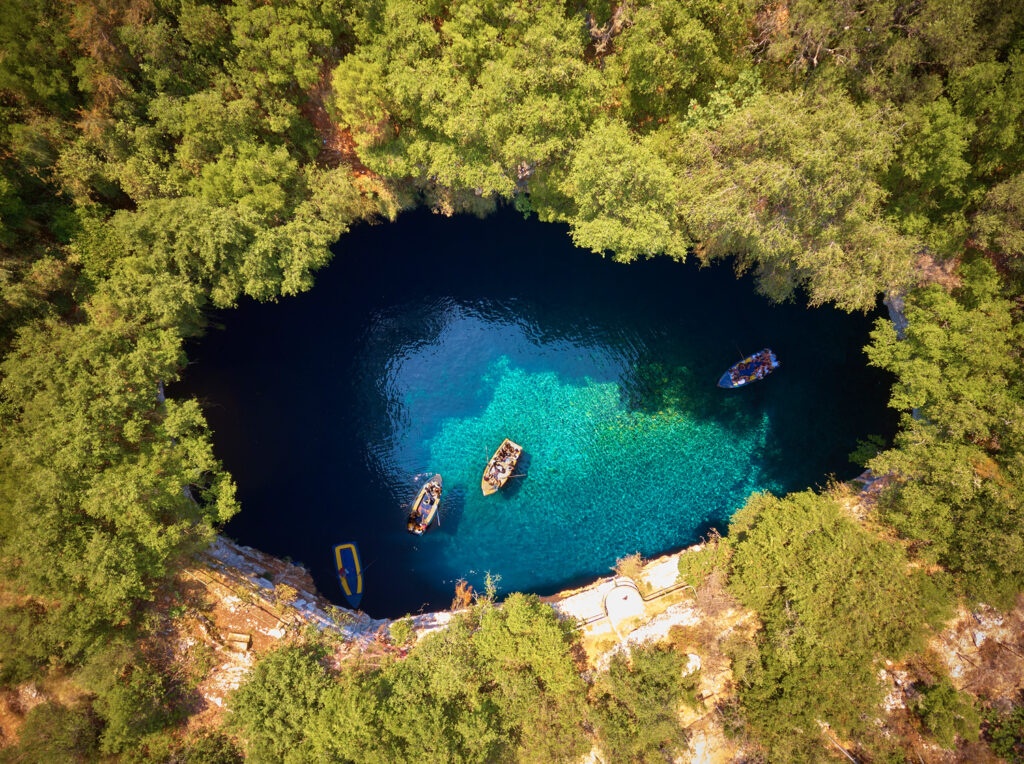 Drone view of Melissani Cave and Lake near Sami village Kefalonia Greece