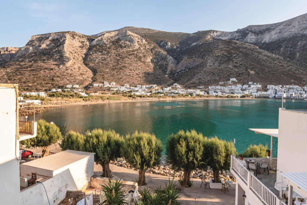 The bay of Sifnos with a long and sandy beach and crystal water surrounded by beautiful mountains. Sifnos island, Greece
