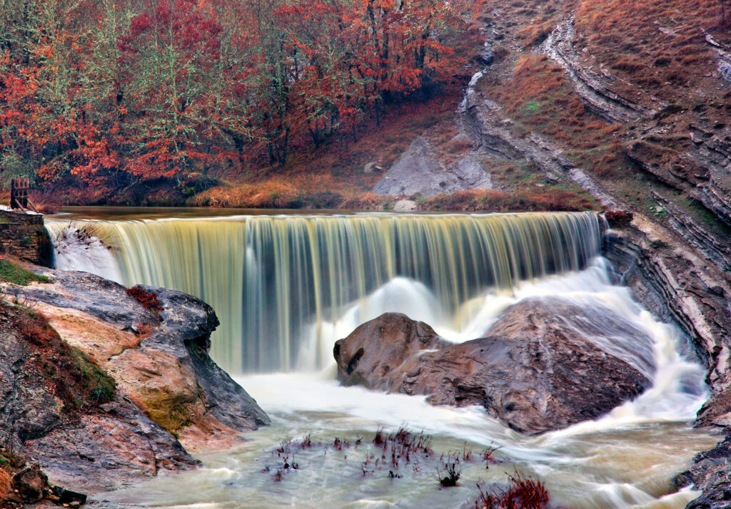 A waterfall of Pramoritsas river and a heart-shaped rock at Chrysavgi village, Voio mountain, Kozani prefecture, Western Macedonia, Greece