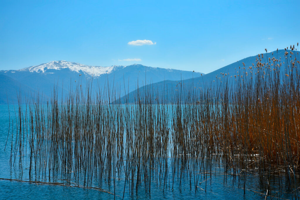 Landscape with panoramic view of Lesser Prespa Lake in Florina, West Macedonia Greece.