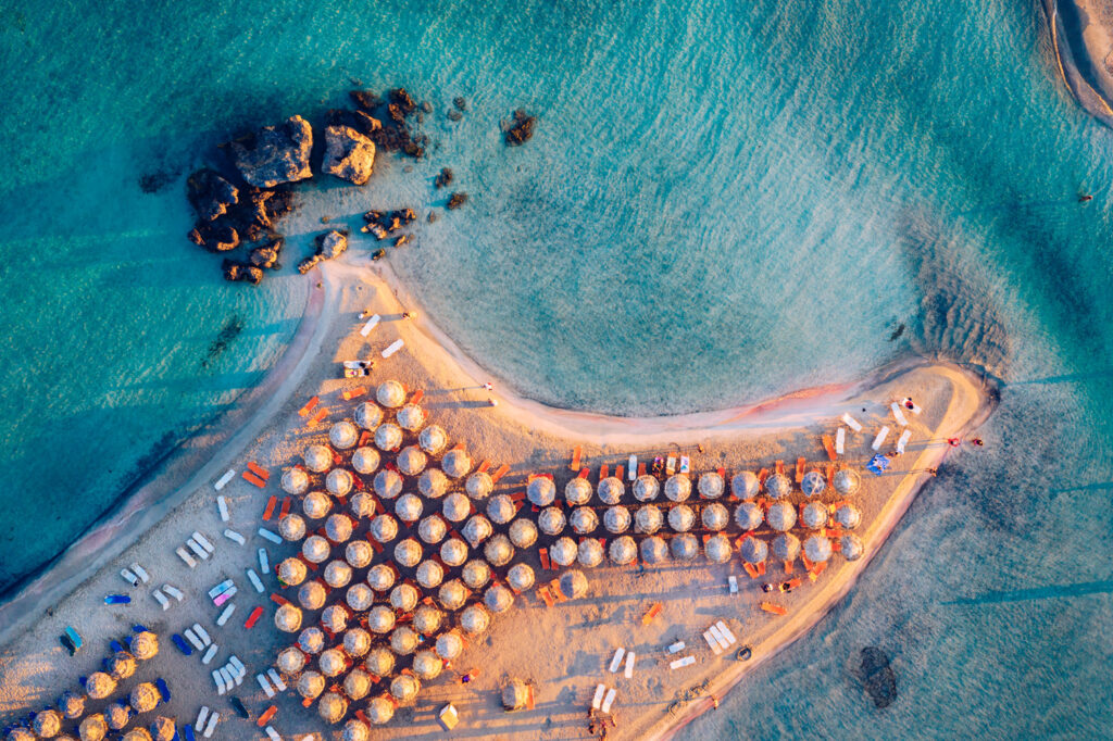 Aerial view of beautiful turquoise water with pink sand Elafonissi, Crete, Greece
