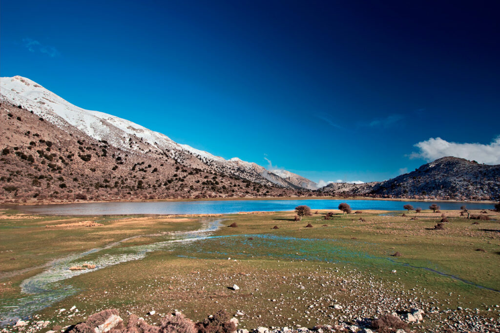 The seasonal lake of Omalos Plateau (also known as "Mikros Omalos" or "Amalos") and Dikti mountain. Viannos municipality, Heraklion, south Crete, Greece.