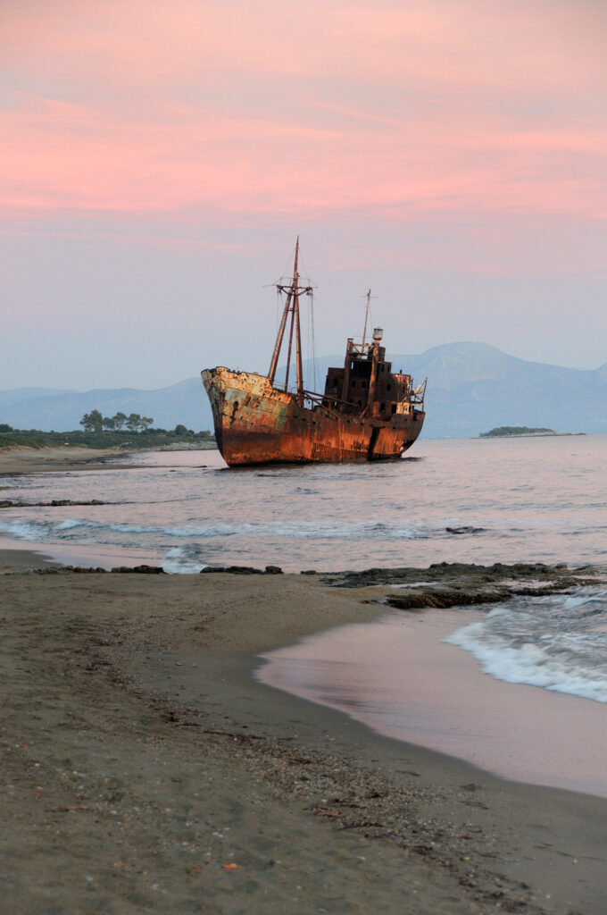The famous Gytheio shipwreck at Selinitsa beach at sunset, Peloponnese, Greece
