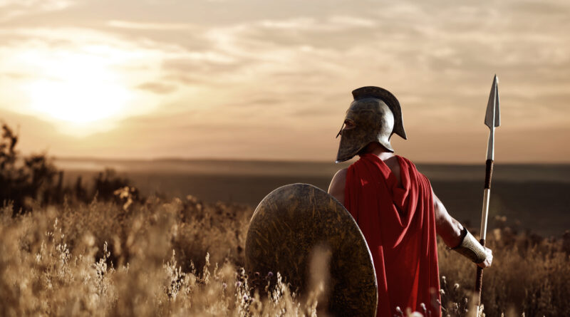 Spartan warrior wearing iron helmet and red cloak, Peloponnese, Greece